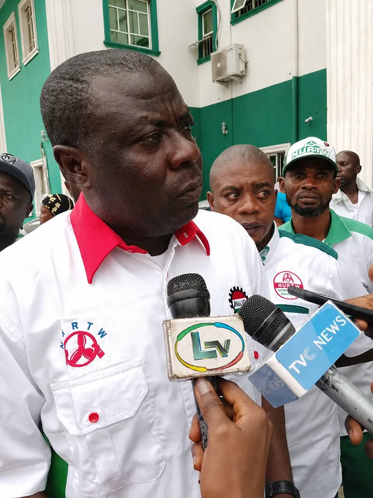A vehicle beneficiary speaking with the media.