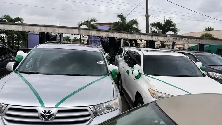 Vehicles lined up for presentation to workers.