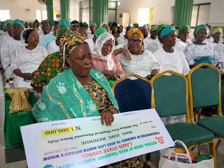 Welfare support handed to a family of deceased staff.