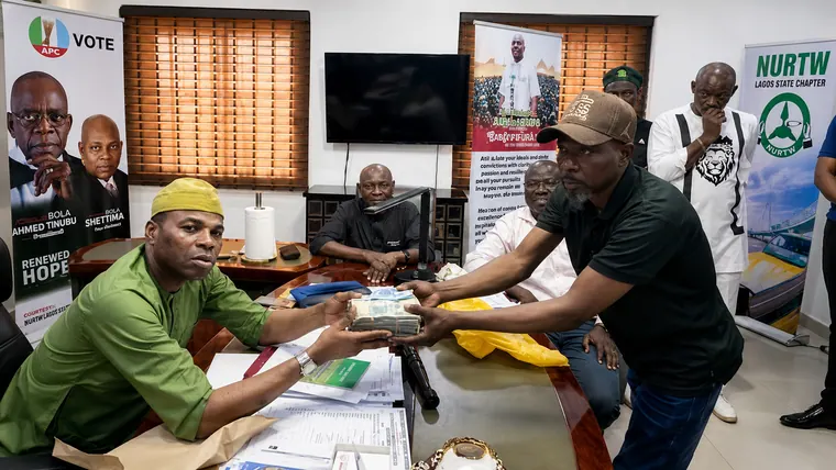 Cash support presented to a staff member.