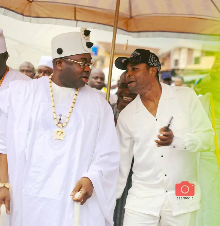 Alhaji Sego with HRM Oba Elegusi at a public engagement.