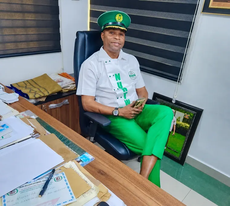 In official uniform, inside the Lagos State Council office.